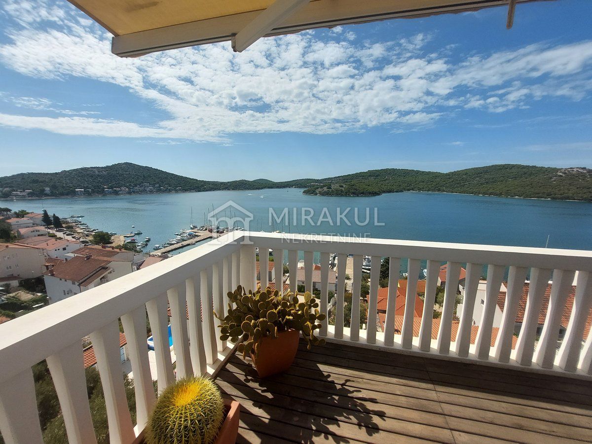 Real estate Tisno, Designer apartment with a large terrace and a panoramic view of the sea and Tisno